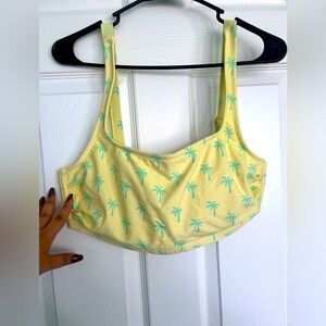 Yellow bikini top with small blue palm tree print